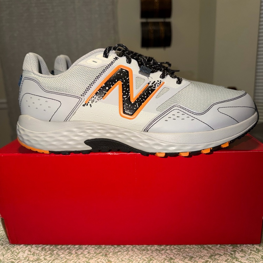New Balance men’s Trail Running size 12 wide white and Orange Men's Sneakers
